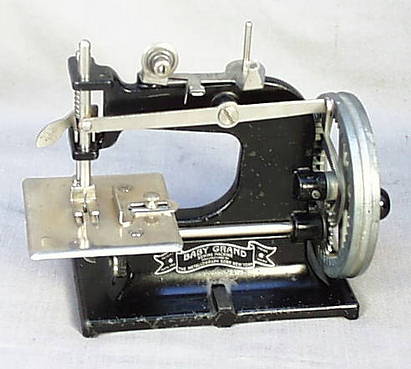 AntiqBuyer.com Antique Cast Iron Toy Sewing Machines Past Sale